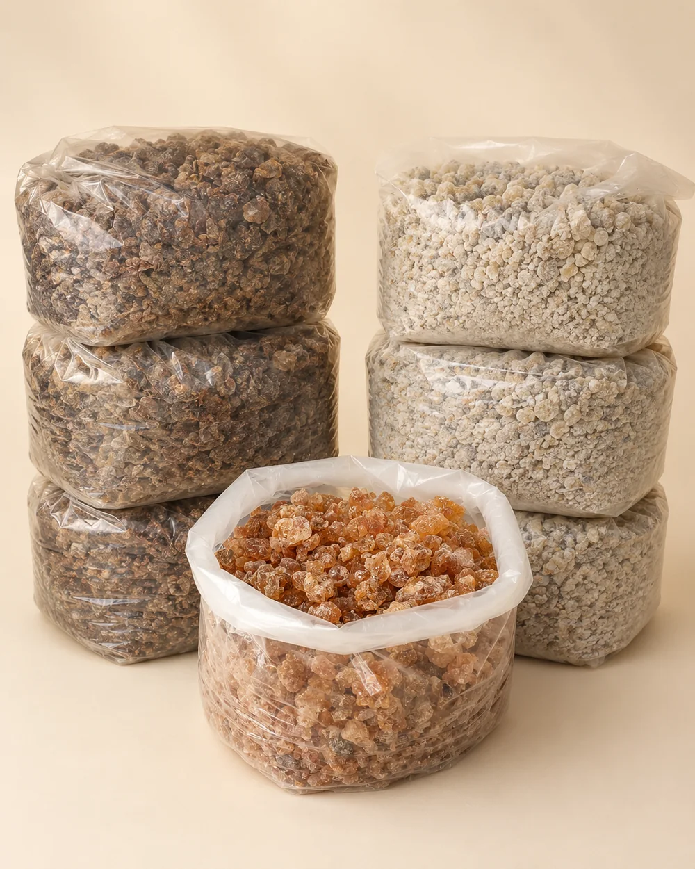 Supplier photograph of amber and translucent gum arabic in bulk bags